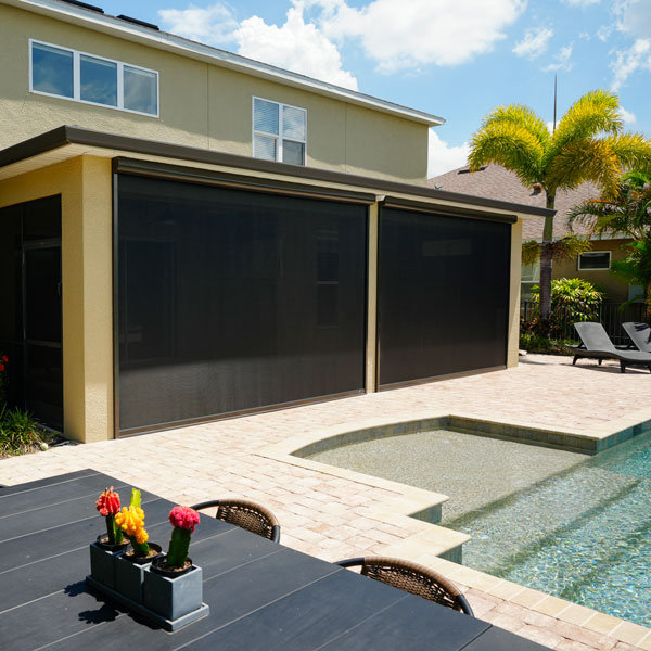 covered patio motorized shades installed by Ventana Outdoor Shades & Awnings in Houston, TX