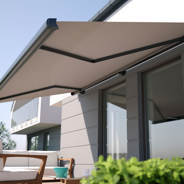 rendering of a motorized awning over a patio seating area